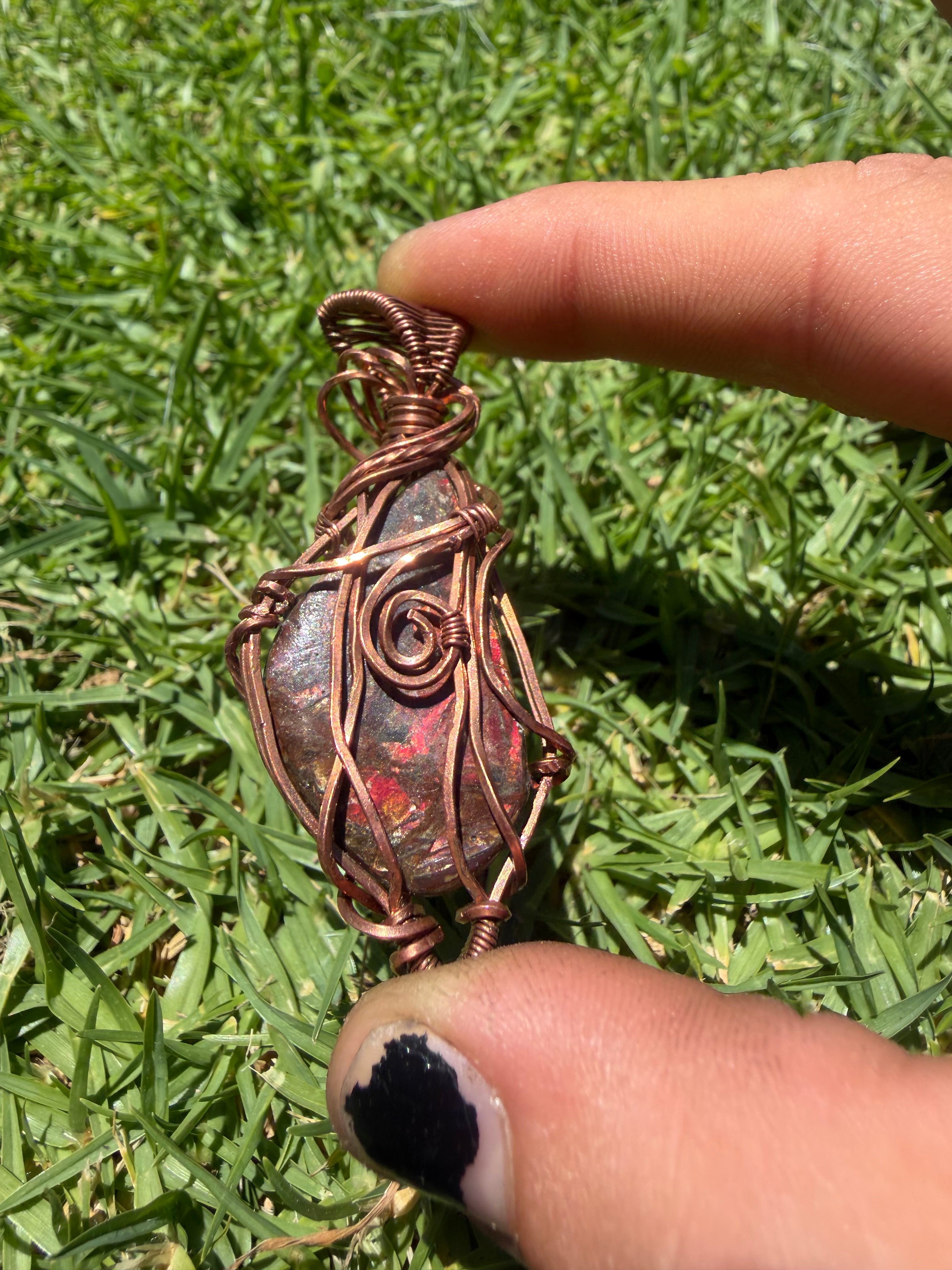 Handmade Opalized Red Ammolite from Canada Pendant Wrapped in Copper