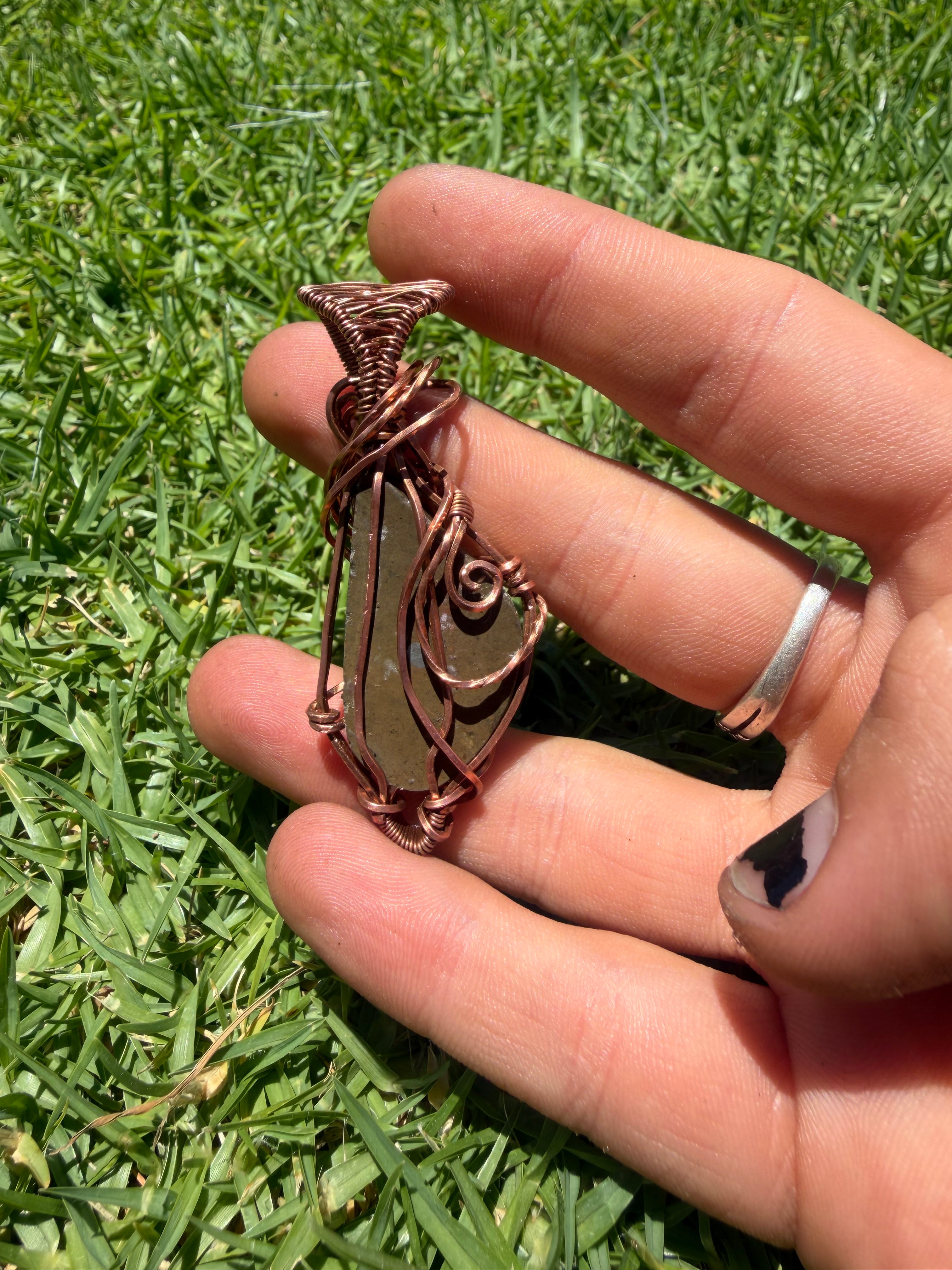 Handmade Opalized Red Ammolite from Canada Pendant Wrapped in Copper