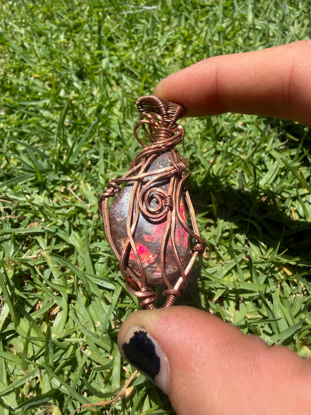 Handmade Opalized Red Ammolite from Canada Pendant Wrapped in Copper